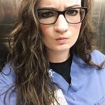 Sexy slut nurse in scrubs showing tits, ass, and pussy