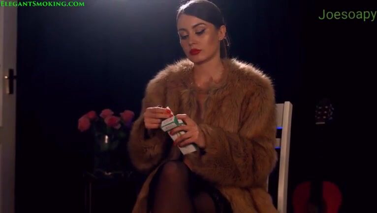 Anna Zapala smoking in fur