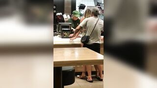 Guy slides into his girl at the McDonald’s counter