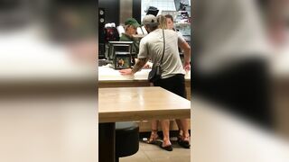 Guy slides into his girl at the McDonald’s counter