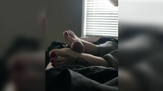 Briana giving a foot job