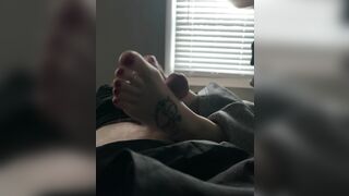 Briana giving a foot job