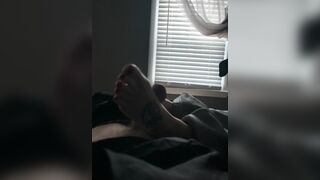 Briana giving a foot job
