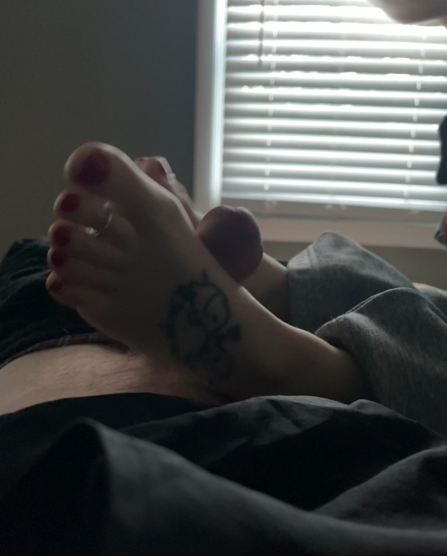 Briana giving a foot job