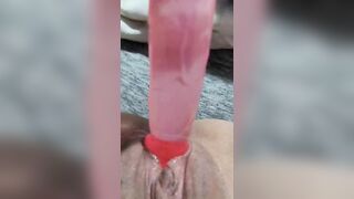 Slutty milf using dildo