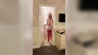 Teasing in her pleaser mules and Ann Summers PVC nurse outfit