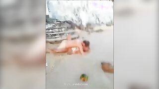 a drunk couple fucking on the bweach and dont care when being caught