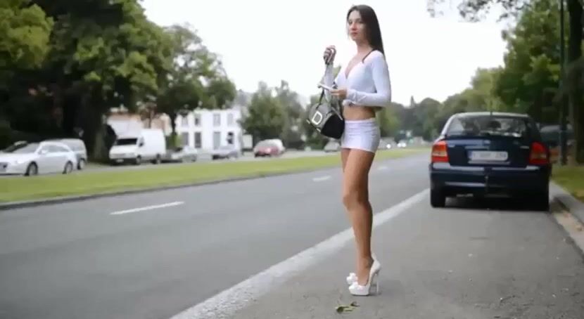 Julie Skyhigh walking the street