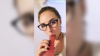 Tori T sucking dildo