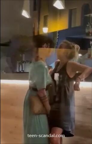 a girl fingering another girl in a bar1