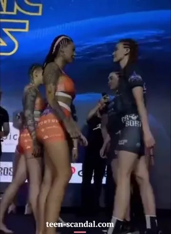 2 cute MMA fighters kiss and expose their tits live on television