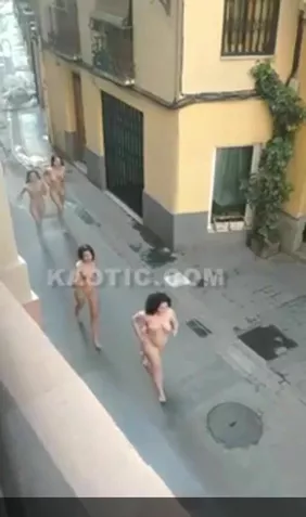 100s of naked women running & walking down the street
